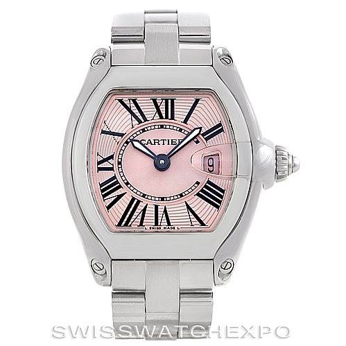 The image shows a frontal view of the Cartier Roadster W62017V3 Women's Stainless Steel Pink Dial W62017V3 Women's Stainless Steel Pink Dial watch, highlighting its silver case, pink dial, and bracelet.