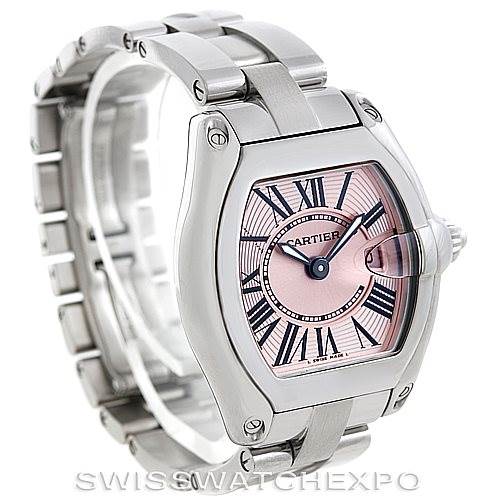 The image shows a Cartier Roadster W62017V3 Women's Stainless Steel Pink Dial W62017V3 Women's Stainless Steel Pink Dial watch at a slight front angle, highlighting the face, bezel, and part of the metal bracelet.