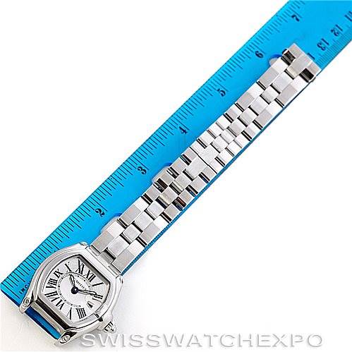 The image shows a Cartier Roadster W62016V3 Women's Stainless Steel Silver Dial W62016V3 Women's Stainless Steel Silver Dial watch laid next to a blue ruler, displaying the face and metal bracelet.