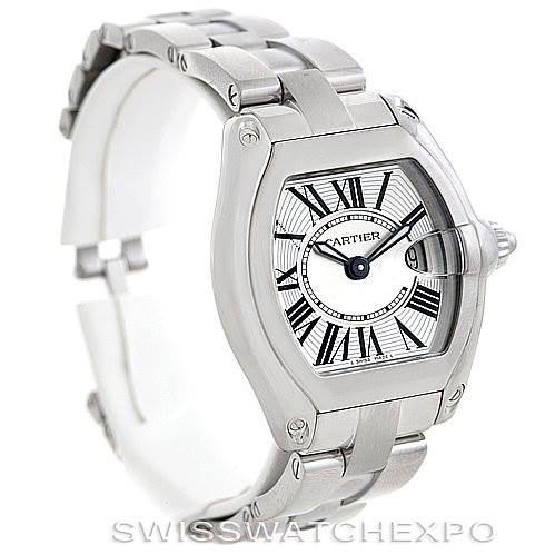 The image shows a three-quarter view of a Cartier Roadster W62016V3 Women's Stainless Steel Silver Dial W62016V3 Women's Stainless Steel Silver Dial watch, highlighting its face, bezel, and metallic strap.