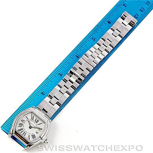 The image shows a Cartier Roadster W62016V3 Women's Stainless Steel Silver Dial W62016V3 Women's Stainless Steel Silver Dial watch from an overhead angle, displaying the face and entire metal bracelet next to a ruler for scale.