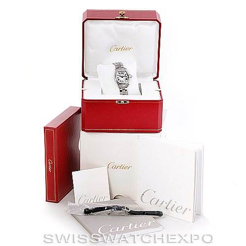 The image shows a Cartier Roadster W62016V3 Women's Stainless Steel Silver Dial W62016V3 Women's Stainless Steel Silver Dial watch in its box along with booklets and additional accessories.