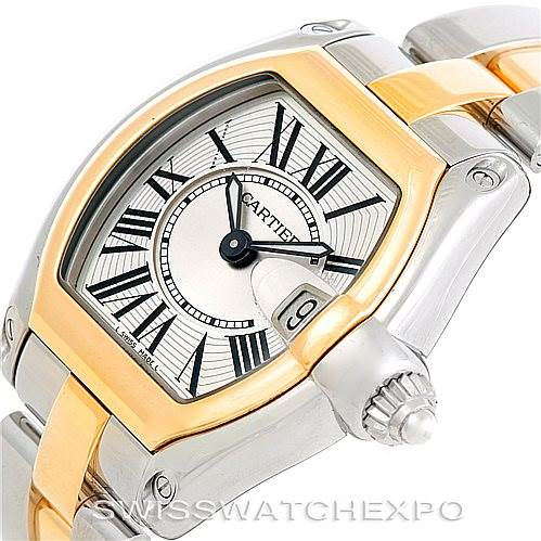 This image shows a Cartier Roadster W62026Y4 Women's Steel and Gold (two tone) Silver Dial W62026Y4 Women's Steel and Gold (two tone) Silver Dial watch at an angle highlighting the face, crown, and part of the bracelet.
