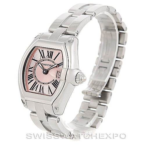 This image shows a Cartier Roadster W62017V3 Women's Stainless Steel Pink Dial W62017V3 Women's Stainless Steel Pink Dial watch from an upper-left angle, displaying its face, case, crown, and bracelet.