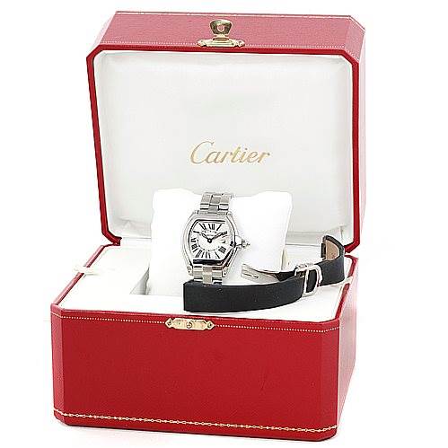 The image shows a Cartier Roadster W62016V3 Women's Stainless Steel Silver Dial W62016V3 Women's Stainless Steel Silver Dial watch and accessories in a red Cartier box, viewed from a slightly elevated angle.