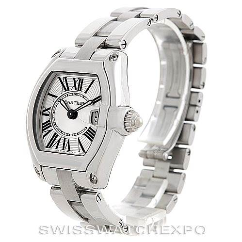 The image shows a Cartier Roadster W62016V3 Women's Stainless Steel Silver Dial W62016V3 Women's Stainless Steel Silver Dial watch at an angle highlighting its face, crown, and metal bracelet.