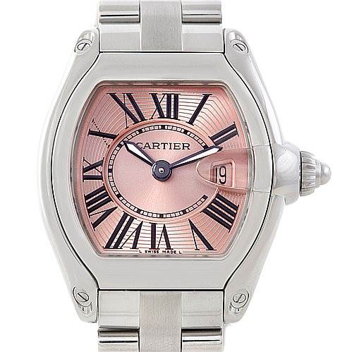 This image shows a Cartier Roadster W62017V3 Women's Stainless Steel Pink Dial W62017V3 Women's Stainless Steel Pink Dial watch from a front angle, displaying its pink dial, Roman numerals, and steel bracelet.