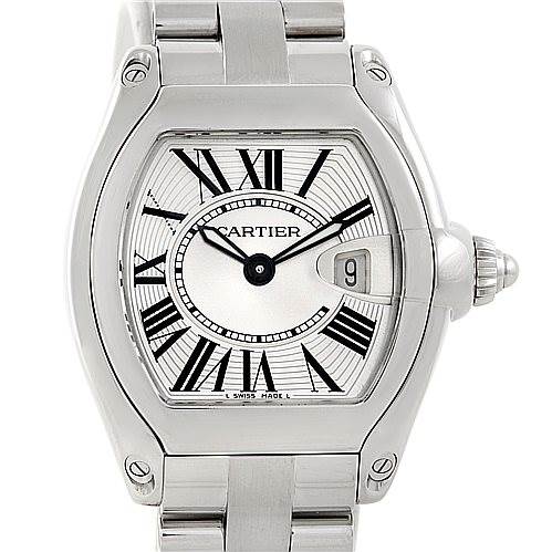 The image shows a face-on view of a Cartier Roadster W62016V3 Women's Stainless Steel Silver Dial W62016V3 Women's Stainless Steel Silver Dial watch, highlighting the dial, Roman numerals, hands, date window, and part of the bracelet.