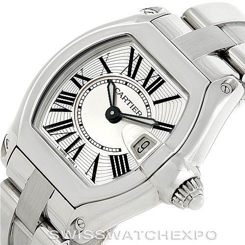 The image shows a Cartier Roadster W62016V3 Women's Stainless Steel Silver Dial W62016V3 Women's Stainless Steel Silver Dial watch from an angled view, highlighting the dial, bracelet, crown, and date window at 3 o'clock.