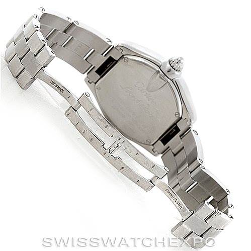 The image shows the back and clasp of a Cartier Roadster W62016V3 Women's Stainless Steel Silver Dial W62016V3 Women's Stainless Steel Silver Dial watch at an angle, displaying its stainless steel bracelet and engravings.