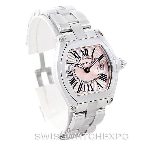 The Cartier Roadster W62017V3 Women's Stainless Steel Pink Dial W62017V3 Women's Stainless Steel Pink Dial watch is shown at a slight angled view, displaying the face, bracelet, and part of the clasp.