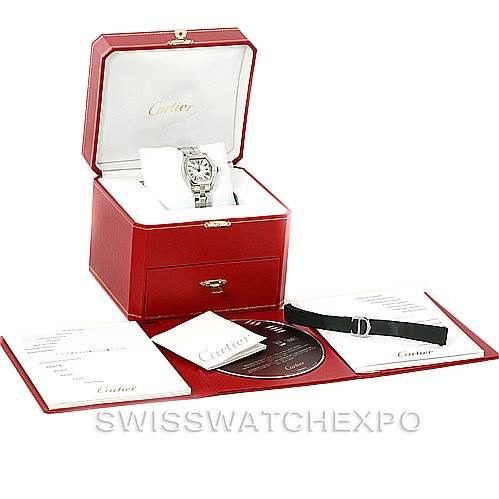 The image shows a Cartier Roadster W62016V3 Women's Stainless Steel Silver Dial W62016V3 Women's Stainless Steel Silver Dial watch with its box, warranty card, manual, extra strap, and CD.