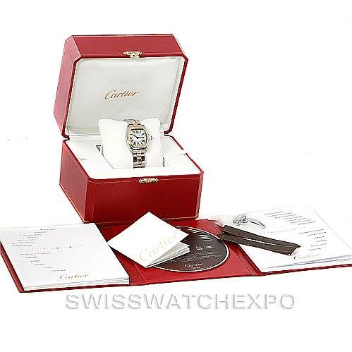 The image shows a Cartier Roadster W62026Y4 Women's Steel and Gold (two tone) Silver Dial W62026Y4 Women's Steel and Gold (two tone) Silver Dial model watch with its red box, user manuals, CD, and accessories arranged neatly around it.