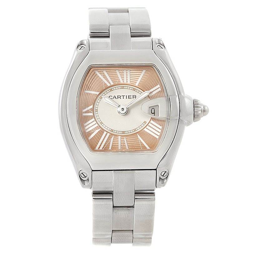 The Cartier Roadster W62054V3 Women's Stainless Steel Pink Dial W62054V3 Women's Stainless Steel Pink Dial watch is shown from a front angle, highlighting its face, case, and stainless steel bracelet.