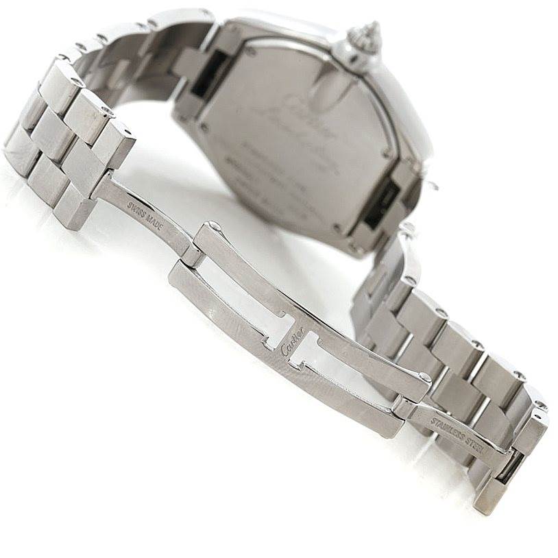 The image shows the steel back cover, bracelet, and clasp of the Cartier Roadster W62054V3 Women's Stainless Steel Pink Dial W62054V3 Women's Stainless Steel Pink Dial watch, viewed from a rear angle.