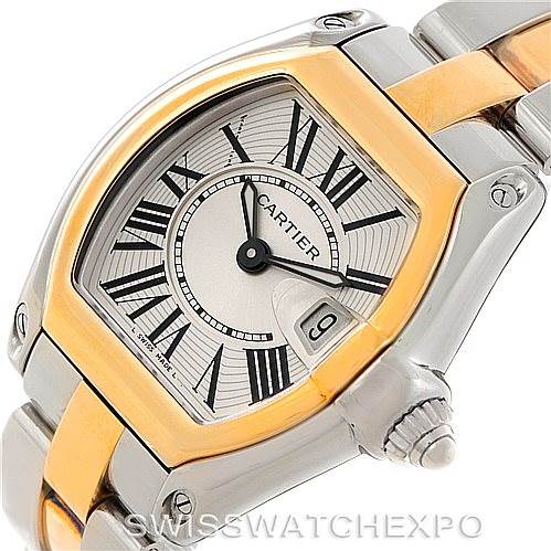 This image shows a close-up angle of the Cartier Roadster W62026Y4 Women's Steel and Gold (two tone) Silver Dial W62026Y4 Women's Steel and Gold (two tone) Silver Dial watch, highlighting its dial, bezel, and part of the bracelet.