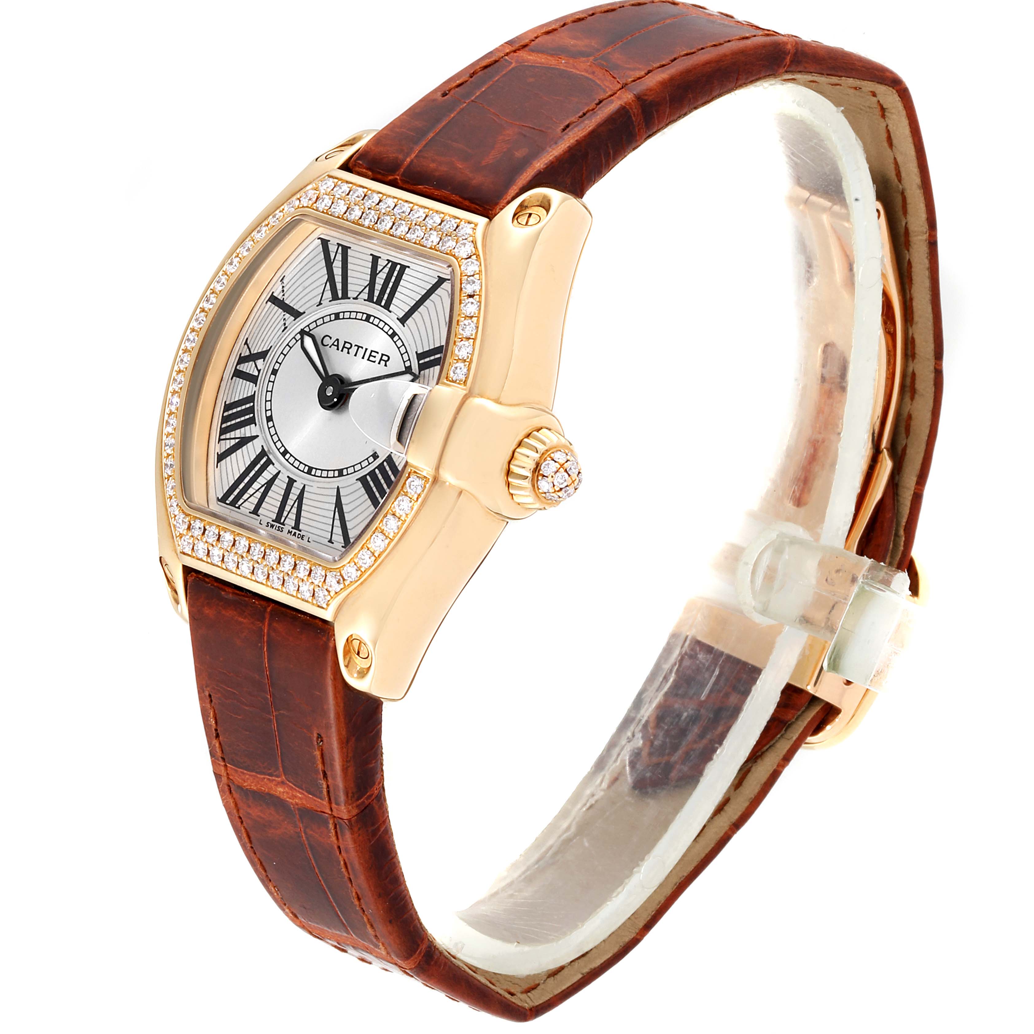 The image shows a Cartier Roadster WE500160 Women's Yellow Gold Silver Dial WE500160 Women's Yellow Gold Silver Dial watch at a slight angle, highlighting its brown leather strap, gold case, and detailed dial.