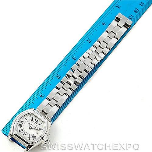 This image shows a Cartier Roadster W62016V3 Women's Stainless Steel Silver Dial W62016V3 Women's Stainless Steel Silver Dial watch from a top-down angle, including the face, bracelet, and a blue ruler for scale.