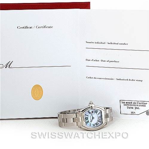 This image shows a Cartier Roadster W6206007 Women's Stainless Steel Mother of Pearl Dial W6206007 Women's Stainless Steel Mother of Pearl Dial watch with a visible face and band, alongside its certificate and packaging.