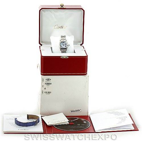 The image shows a Cartier Roadster W6206007 Women's Stainless Steel Mother of Pearl Dial W6206007 Women's Stainless Steel Mother of Pearl Dial watch with its original box, an extra strap, manuals, and a disc, displayed from a front angle.