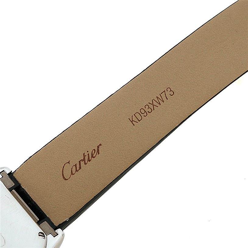 This image shows the underside of the leather strap of a Cartier Roadster W62016V3 Women's Stainless Steel Silver Dial W62016V3 Women's Stainless Steel Silver Dial watch, featuring the brand's name and a serial number.