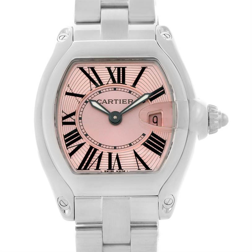 The image shows a Cartier Roadster W62017V3 Women's Stainless Steel Pink Dial W62017V3 Women's Stainless Steel Pink Dial watch from a front angle, highlighting its face, dial, and bracelet.