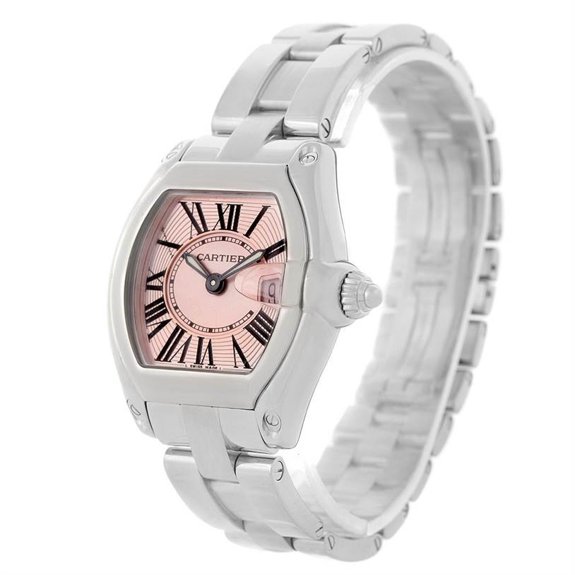This image shows a Cartier Roadster W62017V3 Women's Stainless Steel Pink Dial W62017V3 Women's Stainless Steel Pink Dial watch at a slight side angle, highlighting the pink dial, crown, and stainless steel bracelet.