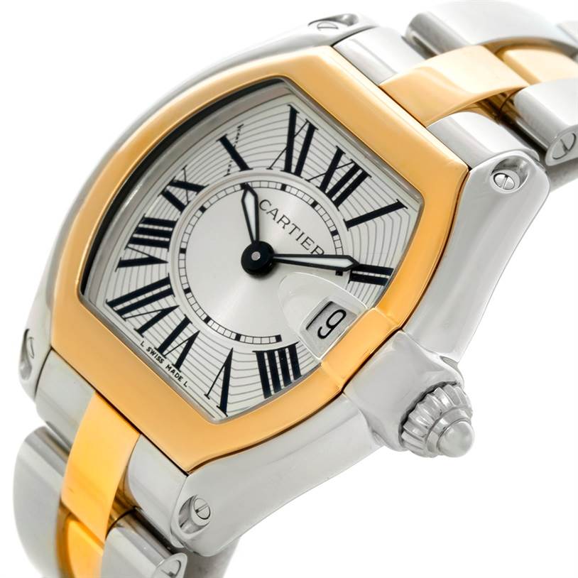 The image shows a close-up angle of the Cartier Roadster W62026Y4 Women's Steel and Gold (two tone) Silver Dial W62026Y4 Women's Steel and Gold (two tone) Silver Dial watch, highlighting its dial, crown, and two-tone bracelet.