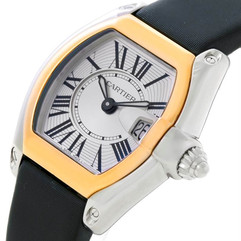 This image shows a close-up angle of a Cartier Roadster W62026Y4 Women's Steel and Gold (two tone) Silver Dial W62026Y4 Women's Steel and Gold (two tone) Silver Dial watch, highlighting its face, bezel, crown, and part of the strap.