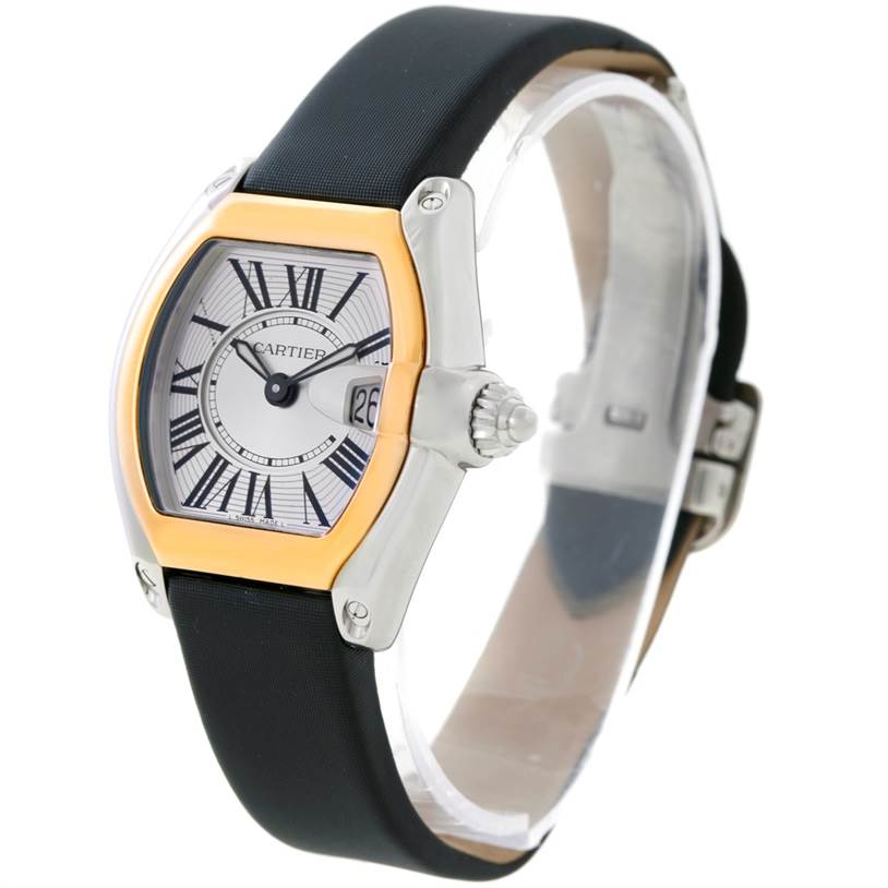 The Cartier Roadster W62026Y4 Women's Steel and Gold (two tone) Silver Dial W62026Y4 Women's Steel and Gold (two tone) Silver Dial watch is shown at an angle displaying its face, bezel, crown, and black strap.