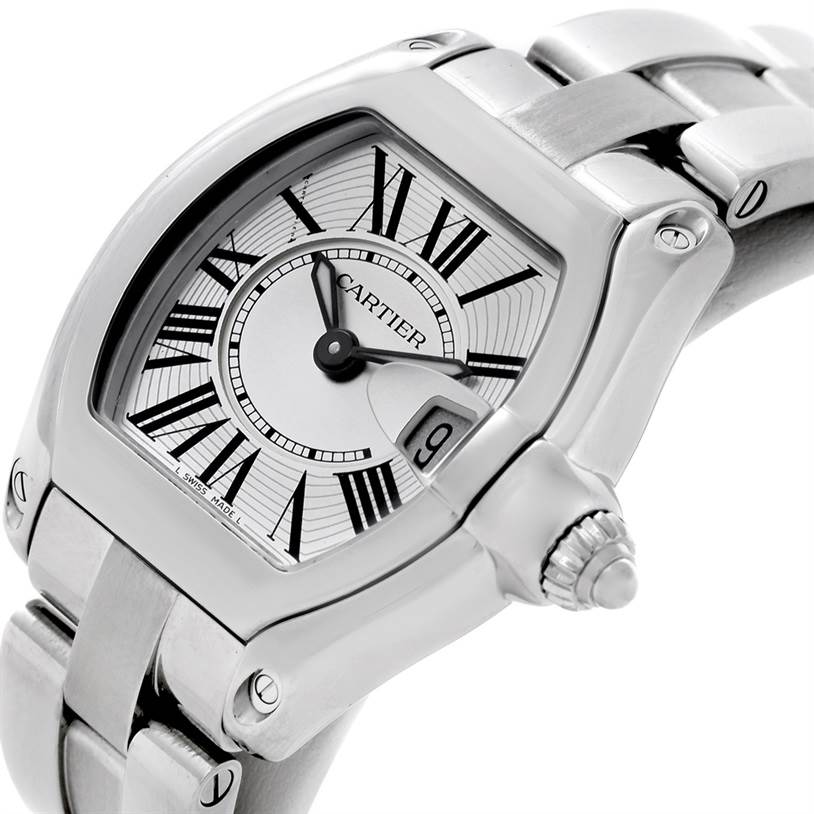 The image displays a close-up angle of the Cartier Roadster W62016V3 Women's Stainless Steel Silver Dial W62016V3 Women's Stainless Steel Silver Dial watch, highlighting its dial, crown, and part of the bracelet.