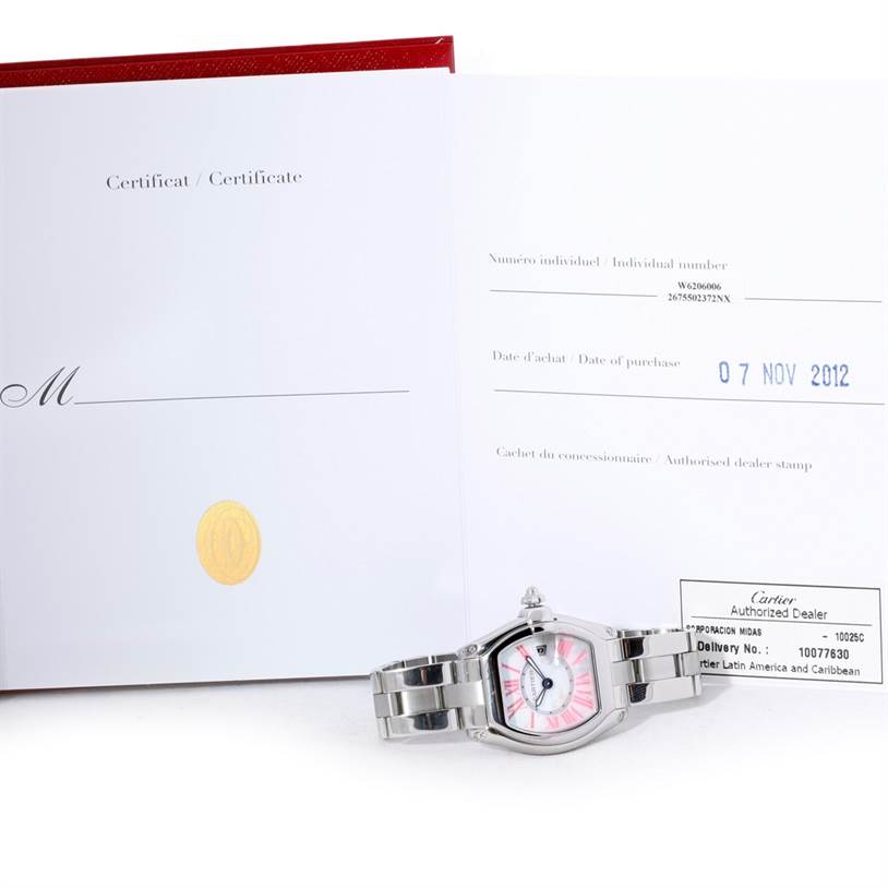 The image shows a Cartier Roadster W6206006 Women's Stainless Steel Mother of Pearl Dial W6206006 Women's Stainless Steel Mother of Pearl Dial watch alongside its certificate and warranty card.