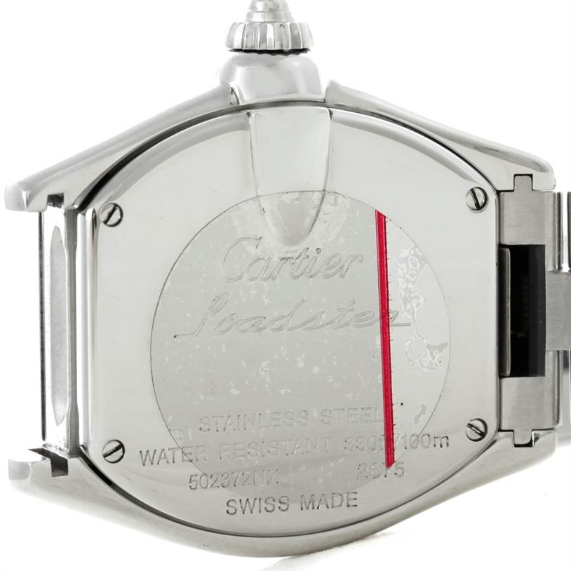 This image shows the back case of a Cartier Roadster W6206006 Women's Stainless Steel Mother of Pearl Dial W6206006 Women's Stainless Steel Mother of Pearl Dial watch with engraved details and the stainless steel finish.