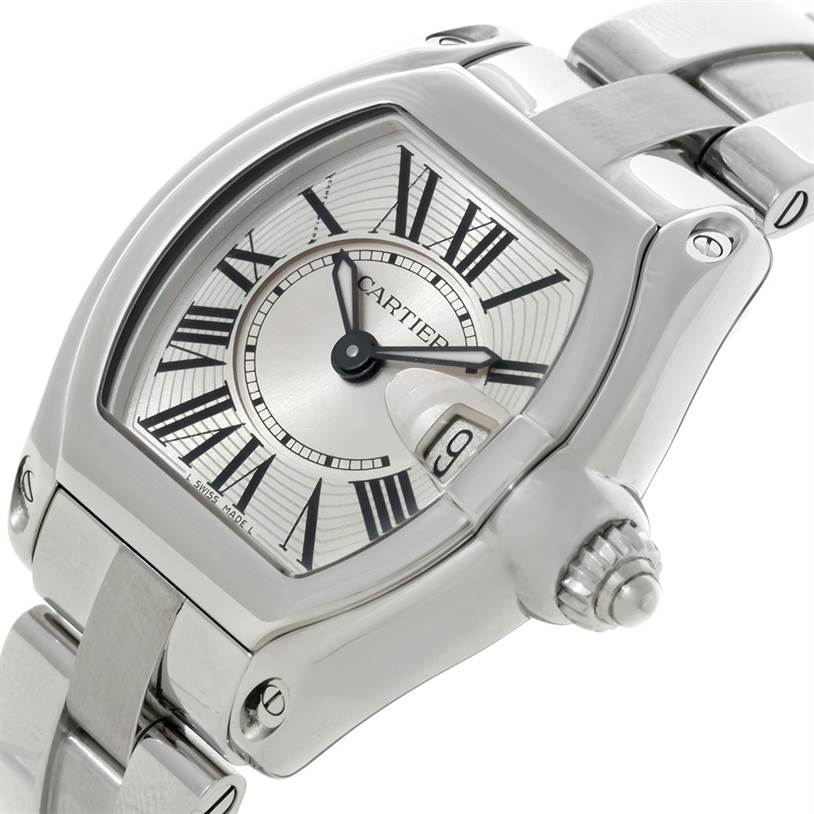 The image shows a close-up of the Cartier Roadster W62016V3 Women's Stainless Steel Silver Dial W62016V3 Women's Stainless Steel Silver Dial watch, focusing on the dial, crown, and partial bracelet.
