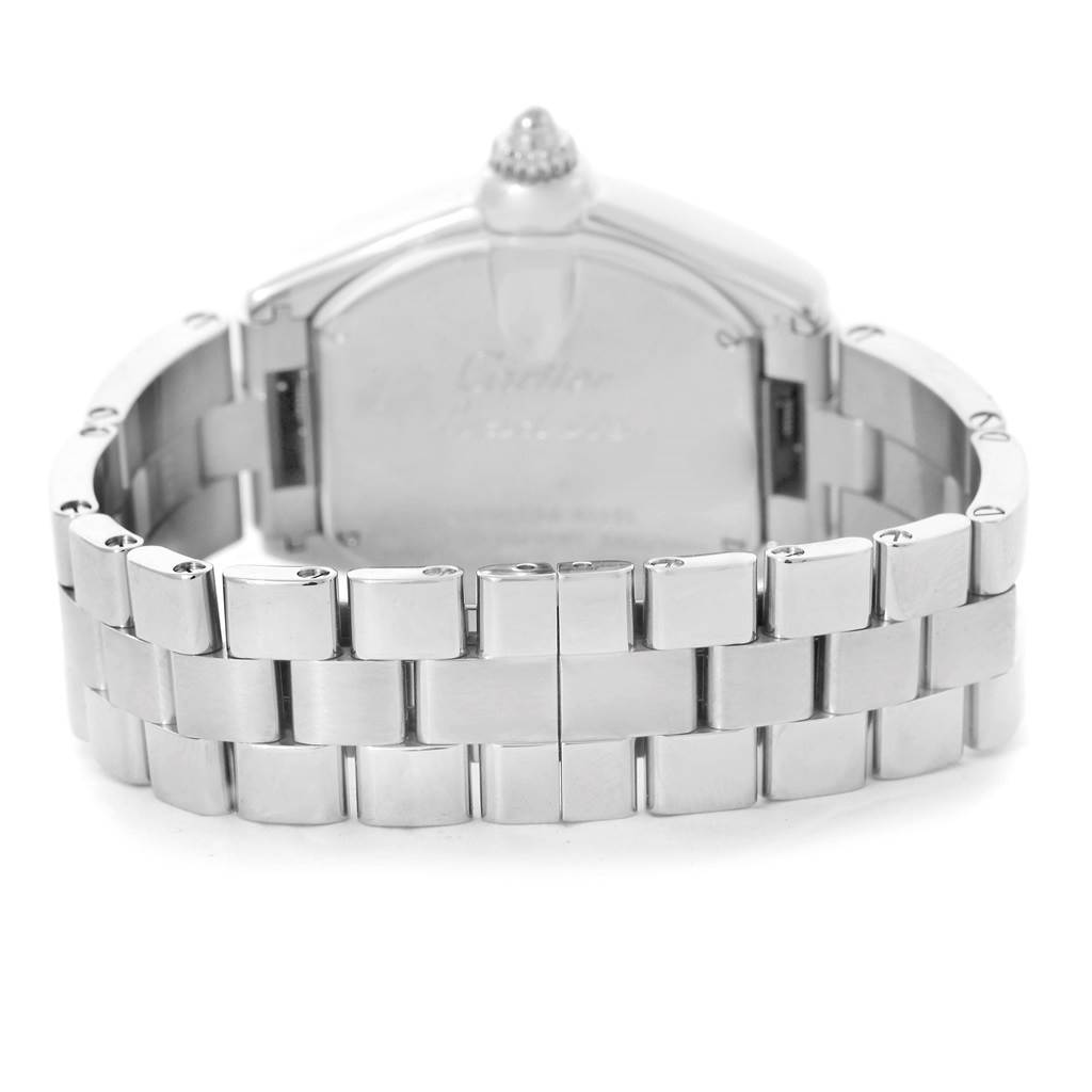 The image shows the back view of a Cartier Roadster W62017V3 Women's Stainless Steel Pink Dial W62017V3 Women's Stainless Steel Pink Dial watch, focusing on its stainless steel bracelet and clasp.