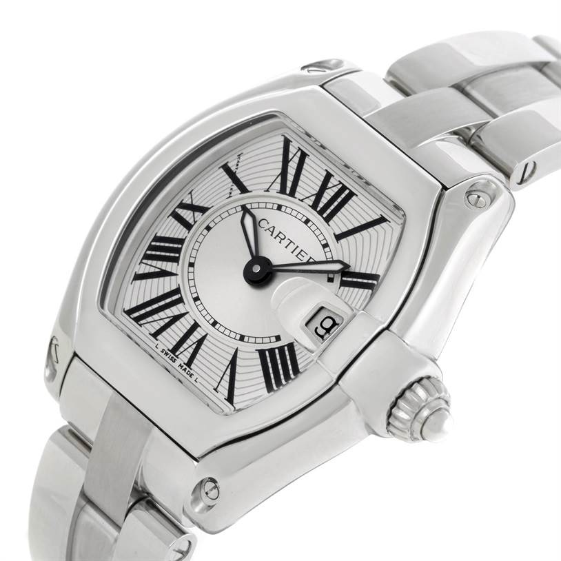 The image shows a close-up angle of the Cartier Roadster W62016V3 Women's Stainless Steel Silver Dial W62016V3 Women's Stainless Steel Silver Dial watch, highlighting its dial, crown, and a section of its bracelet.