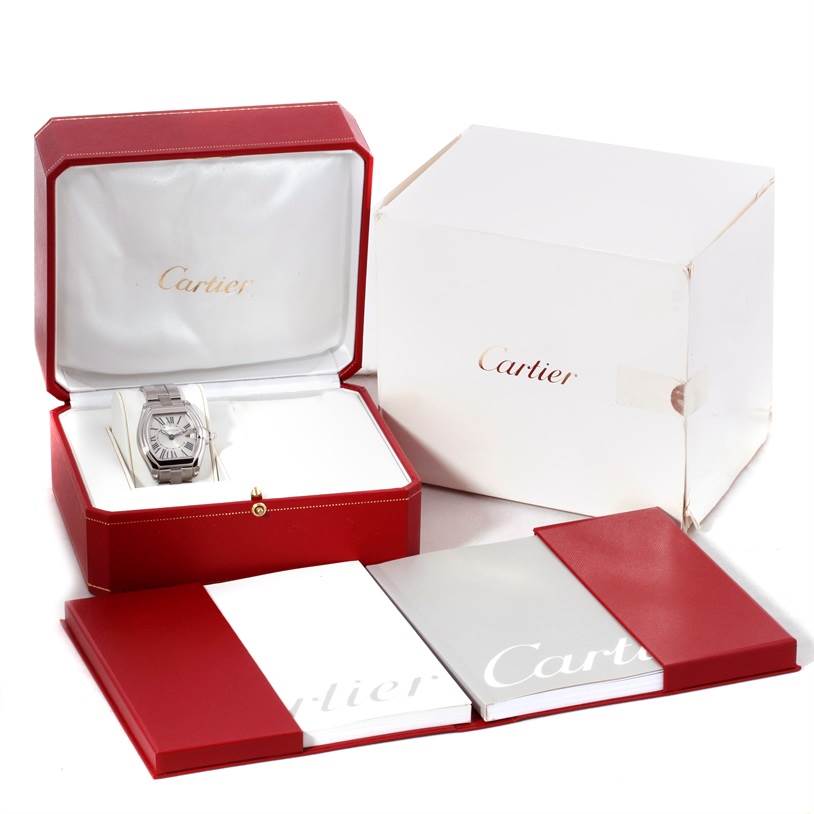 The Cartier Roadster W62016V3 Women's Stainless Steel Silver Dial W62016V3 Women's Stainless Steel Silver Dial watch is displayed in its box with accompanying packaging and manuals.