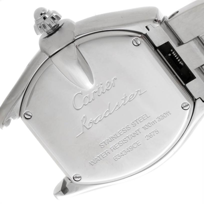 This image shows the back case and crown of the Cartier Roadster W62016V3 Women's Stainless Steel Silver Dial W62016V3 Women's Stainless Steel Silver Dial watch, focusing on its engravings.