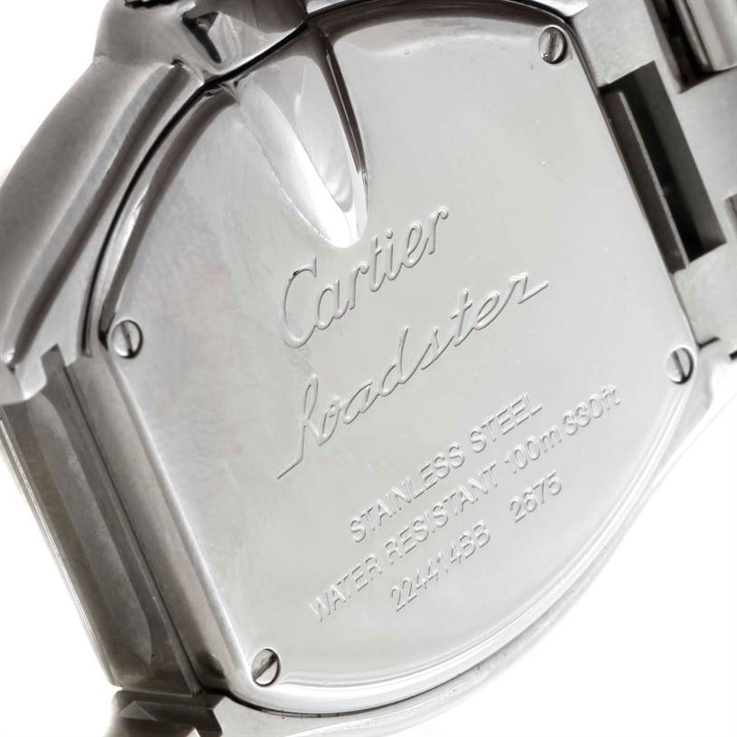The image shows the back casing of a Cartier Roadster W62016V3 Women
s Stainless Steel Silver Dial W62016V3 Women
s Stainless Steel Silver Dial watch, highlighting the brand engraving and specifications.
