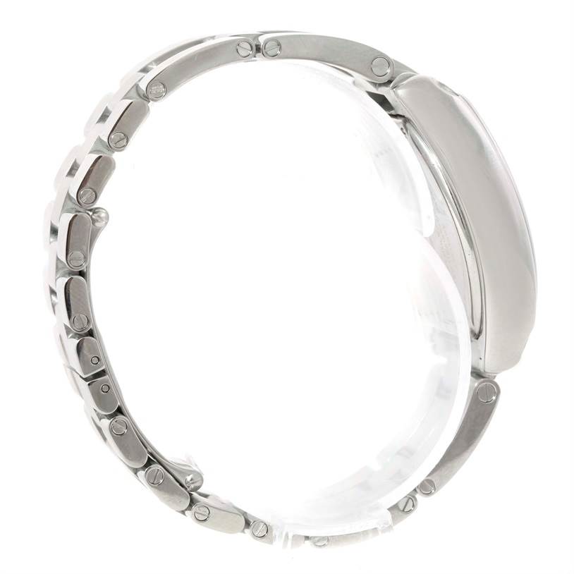 The image shows a side view of a Cartier Roadster W62016V3 Women
s Stainless Steel Silver Dial W62016V3 Women
s Stainless Steel Silver Dial watch, focusing on the bracelet and the case.