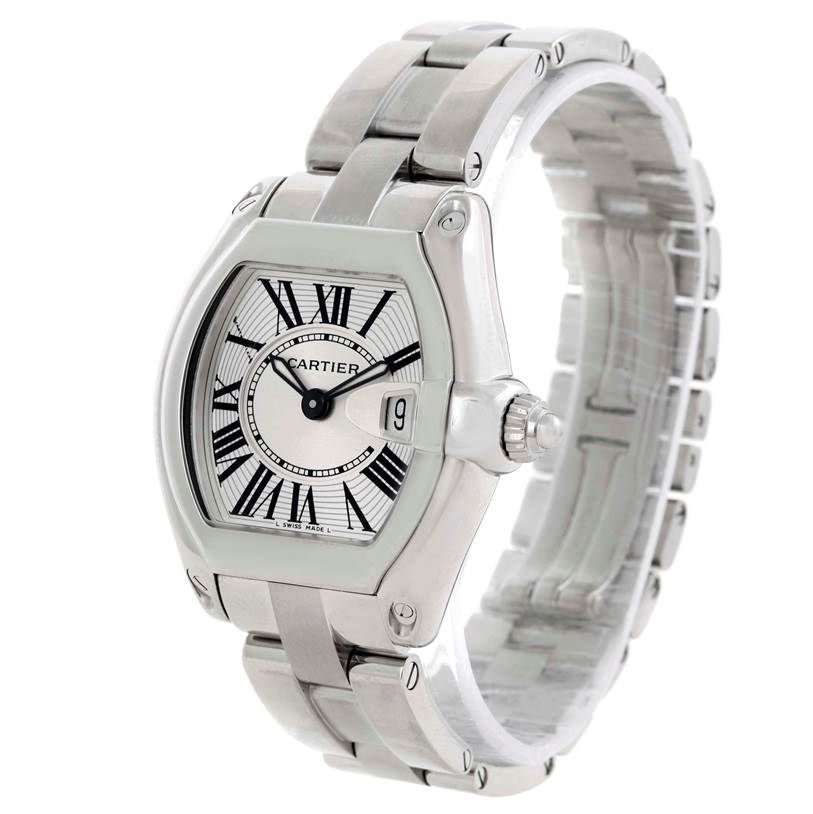 The image shows a Cartier Roadster W62016V3 Women
s Stainless Steel Silver Dial W62016V3 Women
s Stainless Steel Silver Dial watch from an angled view, highlighting its stainless steel case, bracelet, and Roman numeral dial.