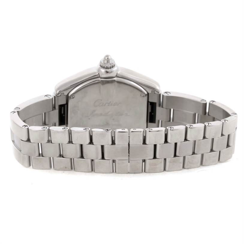 The image shows the back view of a Cartier Roadster W62016V3 Women
s Stainless Steel Silver Dial W62016V3 Women
s Stainless Steel Silver Dial watch, focusing on the stainless steel bracelet and case back.