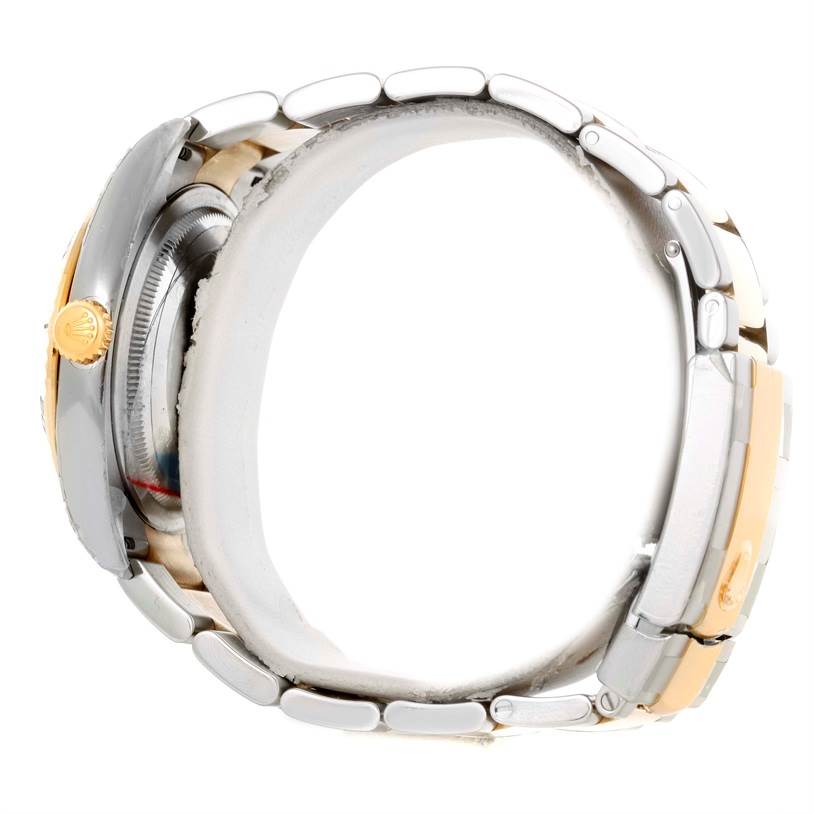 The image shows a Rolex Turn-o-Graph 116263 Men's Steel and Gold (two tone) White Dial 116263 Men's Steel and Gold (two tone) White Dial watch from a side angle, highlighting the crown and metal bracelet.