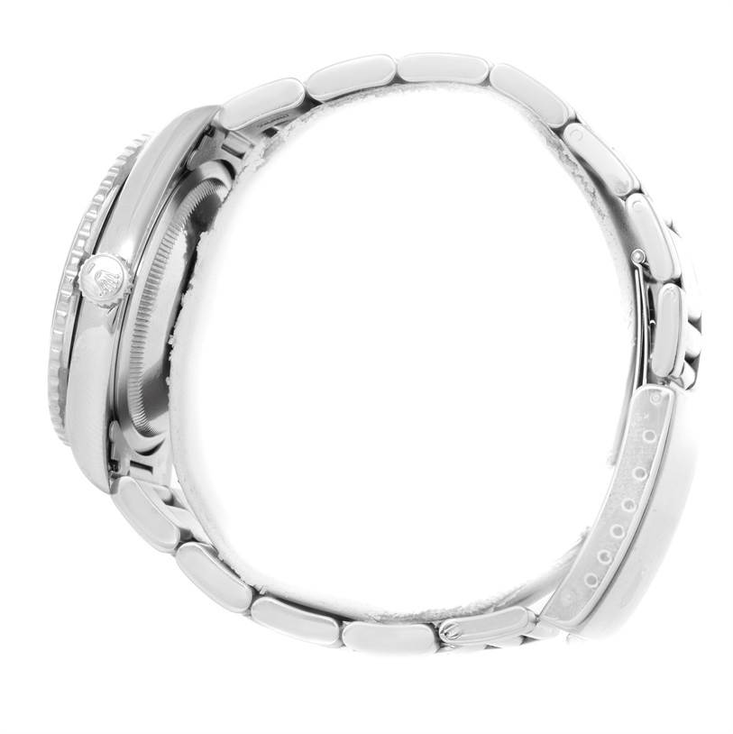 The image shows a side view of the Rolex Turn-o-Graph 16264 Men's Stainless Steel Blue Dial 16264 Men's Stainless Steel Blue Dial watch, highlighting the bezel, crown, and bracelet with a partially visible clasp.