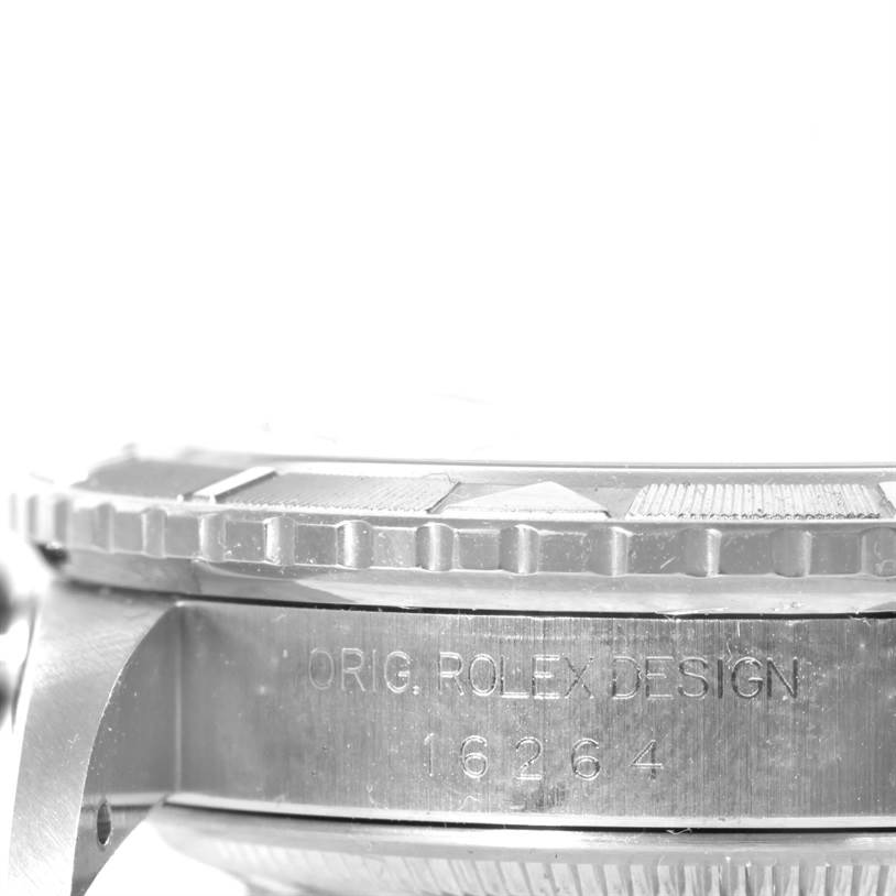 This image shows a close-up side view of the engraved case and bezel of a Rolex Turn-o-Graph 16264 Men's Stainless Steel Black Dial 16264 Men's Stainless Steel Black Dial watch.