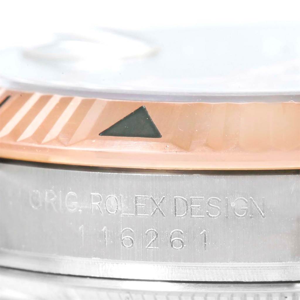 This image shows a close-up of the bezel and case side of the Rolex Turn-o-Graph 116261 Men's Stainless Steel Black Dial 116261 Men's Stainless Steel Black Dial, highlighting the engraved model information.
