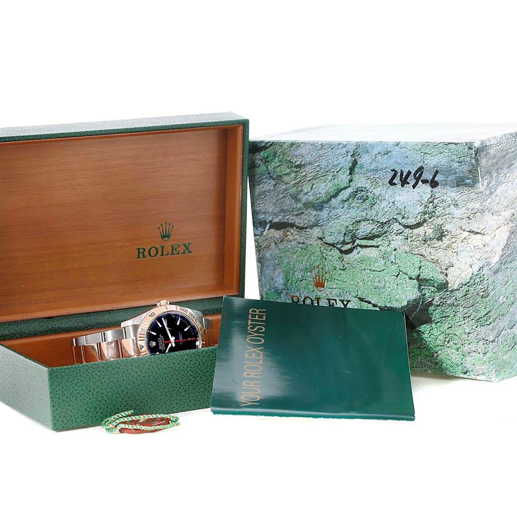 The Rolex Turn-o-Graph 116261 Men's Stainless Steel Black Dial 116261 Men's Stainless Steel Black Dial watch is shown inside its open box, alongside the outer box and a manual booklet.