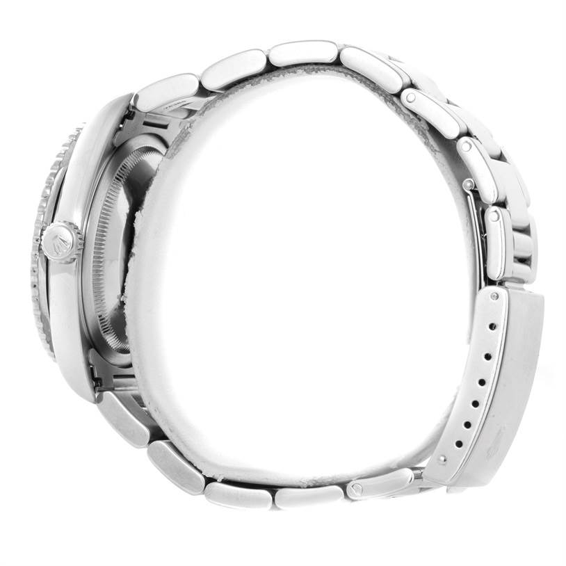 The image shows a side profile of a Rolex Turn-o-Graph 16264 Men's Stainless Steel Black Dial 16264 Men's Stainless Steel Black Dial watch, highlighting its case, crown, and metal bracelet with clasp.