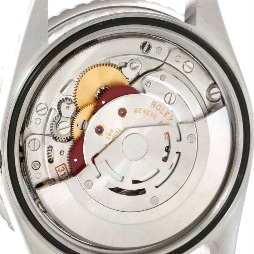 This image displays the internal mechanism and components of a Rolex Turn-o-Graph 16264 Men's Stainless Steel White Dial 16264 Men's Stainless Steel White Dial watch from a rear, close-up angle.