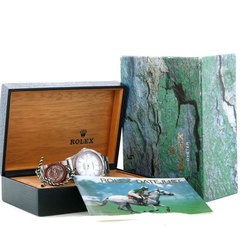 The image shows a Rolex Turn-o-Graph 16264 Men's Stainless Steel White Dial 16264 Men's Stainless Steel White Dial watch in its open box, along with its outer box and an accompanying booklet.